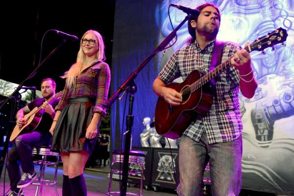 MOUNTAIN VIEW, CA - SEPTEMBER 11: (L - R) Travis Steve, Shawndra Edwards, and Claudio Sanchez of Coheed and Cambria perform as part of the Rockstar Energy Drink Uproar Festival at Shoreline Amphitheatre on September 11, 2013 in Mountain View, California.