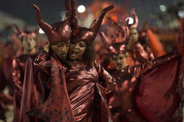 Performers from the Salgueiro samba school dance during Carnival celebrations at the Sambadrome in Rio de Janeiro, Brazil, Monday, Feb. 27, 2017.