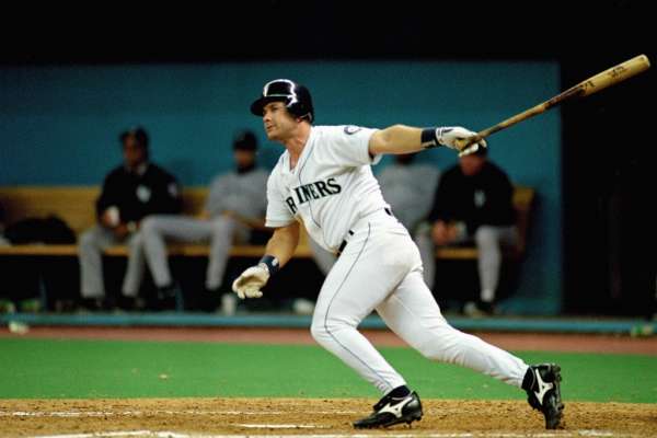 SEATTLE - OCTOBER 8:  Edgar Martinez #11 of the Seattle Mariners doubles home the game winning runs in Game five of the 1995 American League Divisional Series against the New York Yankees at the Kingdome on October 8, 1995 in Seattle, Washington. The Mariners defeated the Yankees 6-5 in 11 innings to win the series three games to two. (Photo by Stephen Dunn/Getty Images)