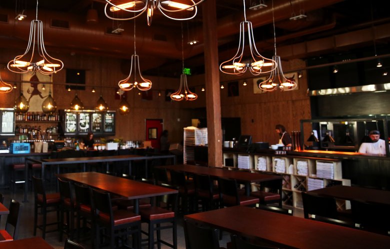 STARBUCKS 120314
A new Tom Douglas Serious Pie restaurant is located inside the Starbucks Reserve Roastery and Tasting Room in Capitol Hill. The eatery offers wood-fired artisanal pizza. 
 143467