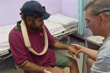 Doctor treating an Indigenous patient at a remote Northern Territory health clinic