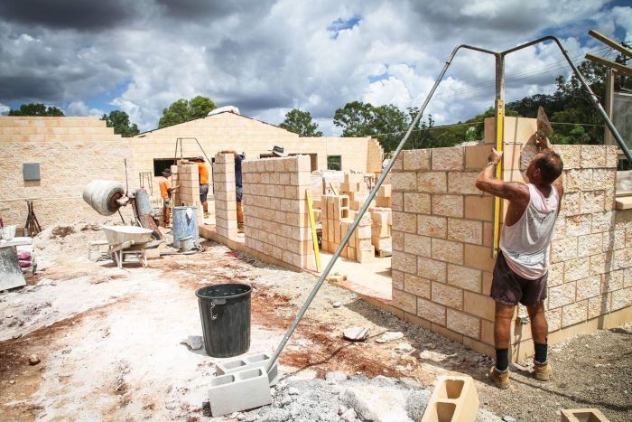 Workers building the new Kandanga Hotel in March 2017 in Queensland's Mary Valley