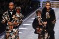 Model Amanda Harwey and her husband Jason Harwey and their sons Noah, right, and Rose, wear creations for Dolce&Gabbana ...