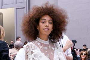 Solange Knowles looks angelic wearing a pretty white dress with sheer details and ruffles at the Chloé runway ...