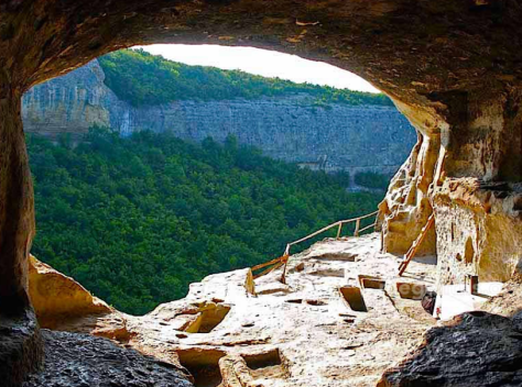 ...this one in Russia looks like Anasazi cliff dwellings in the US Southwest...