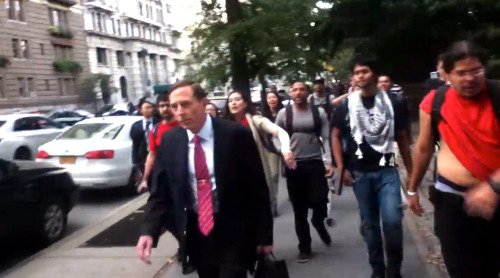 Students from the Ad-Hoc Committee protesting war criminal Petreaus.  Photo Credit: NYMag