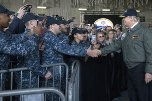 President Donald J. Trump greets sailors after entering the hangar bay aboard the future USS Gerald R. Ford in Newport News, Va., Mar. 2, 2017. Trump met with sailors and shipbuilders of the Navy’s newest aircraft carrier.