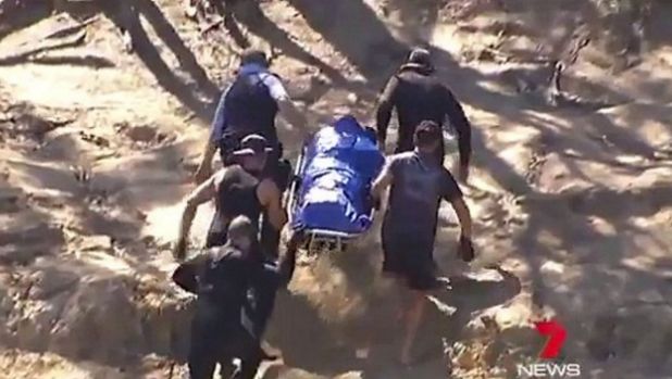 The body of the five-year-old is taken from the river.