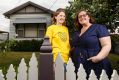 Grace Bugg, 11, who was diagnosed with autism when she was 5, with her mother Renee. 