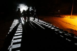 Migrants from Somalia cross into Canada from the United States by walking down a train track into the town of Emerson, ...