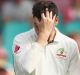 Second knock: Matt Renshaw with Australia skipper Steve Smith after being hit on the helmet while fielding.