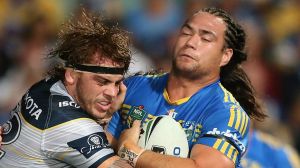 Muscling up: Tepai Moeroa hits it up for Parramatta Eels against the North Queensland Cowboys at Pirtek Stadium.