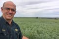 Farmer Peter Thompson with his bumper chickpea crop. 