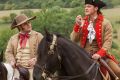 Josh Gad as Le Fou, left, and Luke Evans as Gaston in a scene from Beauty and the Beast. 