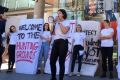 Students from the University of Sydney's  Women's Collective, survivors of campus sexual assault, and their supporters ...
