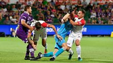 PERTH, AUSTRALIA - FEBRUARY 25:  Scott Neville of the Wanderers and Liam Reddy of the Glory clash during the round 21 ...