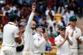 Nathan Lyon celebrates his 8-50 on day one.