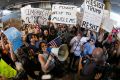 Demonstrators at Los Angeles International Airport in January protest President Trump's travel ban.