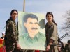 ybs_and_pkk_fighters_holding_up_a_painting_of_abdullah_calan.jpg