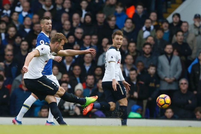 Harry Kane (nearest camera) shoots and scores for Spurs against Everton at White Hart Lane. 