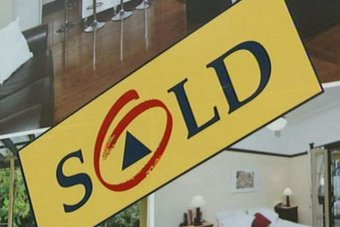 Real estate agent's house sold sign