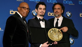 Damien Chazelle (C), winner of the Feature Film Award for his work on "La La Land"