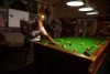 Footscray hotel resident Johnny plays pool