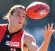 St Kilda's Jack Steele is tackled by Carlton's Ed Curnow.