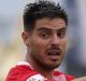 City's Bruno Fornaroli appeals for a free kick after an incident with Mariners keeper Paul Izzo.