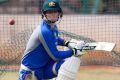 Proud: Steve Smith bats in the nets during a training session in Bangalore.