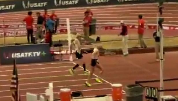 Ninety-nine-year old Orville Rogers, right, runs down Dixon Hemphill to win the 60m USA masters indoors title.