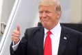 Thumbs up: US President Donald Trump arrives in Florida on Friday ahead of his latest Twitter storm.