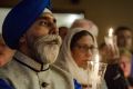 Hundreds of people attend a vigil in Olathe, Kansas, ast week,  in response to the deadly shooting of Srinivas Kuchibhotla.