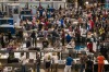 Passengers queue at TSA security lines at Denver International Airport.