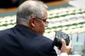 Federal Treasurer Scott Morrison brought a lump of black coal to Parliamentary question time last Thursday to stress the ...