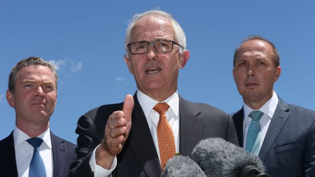 Ministers Christopher Pyne, and Peter Dutton flank Prime Minister Malcolm Turnbull.