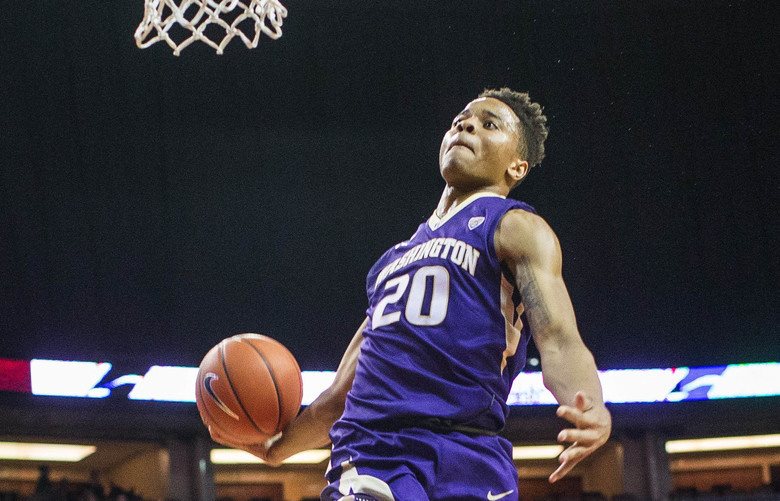 Markelle Fultz winds up and jams home the bucket off the breakaway, giving the Huskies a 86-62 2nd half lead.  The University of Washington men’s basketball team played Seattle University at KeyArena in Seattle, Thursday, December 22, 2016.