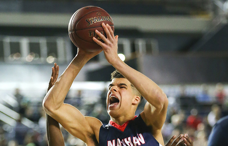 Michael Porter Jr of Nathan Hale shoots over the Garfield defense in the first half.

Nathan Hale played Garfield in the 3A boys championship game of the Hardwood Classic on Saturday, March 4, 2017, at the Tacoma Dome.