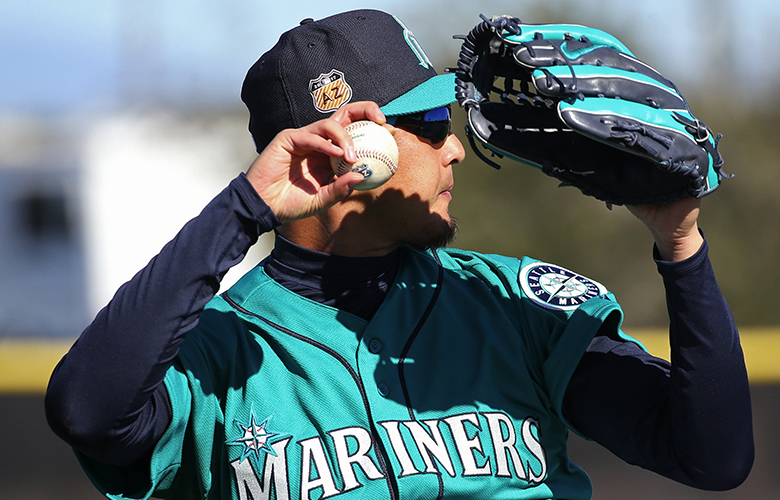 Seattle Mariners pitcher Hisashi Iwakuma pitches workout during the second day of spring training, Wednesday, Feb.