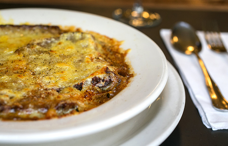 Gratin lyonnais (Lyon-style caramelized onion soup made with chicken stock, sherry and thyme with crouton and gruyere cheese) as prepared by chef Jim Drohman at Le Pichet on Friday, February 3, 2017, in Seattle.