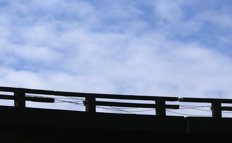 A railing atop the Viaduct shows signs of deterioration. (Ken Lambert/The Seattle Times)