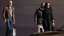 Former President Barack Obama accompanied by former first lady Michelle Obama leaves the National Gallery of Art in ...