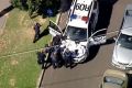 Police outside the Dandenong property on Tuesday.