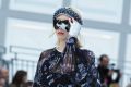 A model wears a creation for Chanel's Fall-Winter 2017/2018 ready-to-wear in Paris.