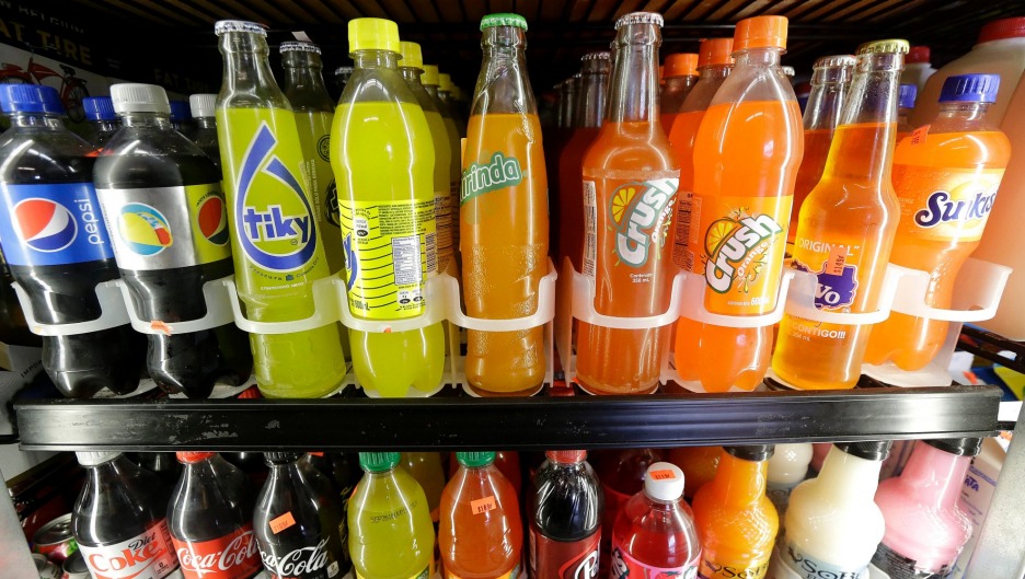 Soft drinks in a vending machine.