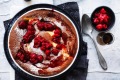 Ricotta souffle pudding with raspberries.