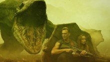 Brie Larson and Tom Hiddleston hide from a monster in Kong: Skull Island.