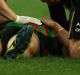 SYDNEY, AUSTRALIA - AUGUST 02:  Kyle Turner of the Rabbitohs is assisted from the field after a concussion during the ...