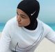  Zahra Lari, a figure skater from the United Arab Emirates, models the new headgear.