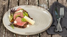 Local grass-fed beef is on the menu at Homage restaurant, Hidden Vale.